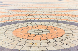 Circular patterns in paved driveways by MMAS construction